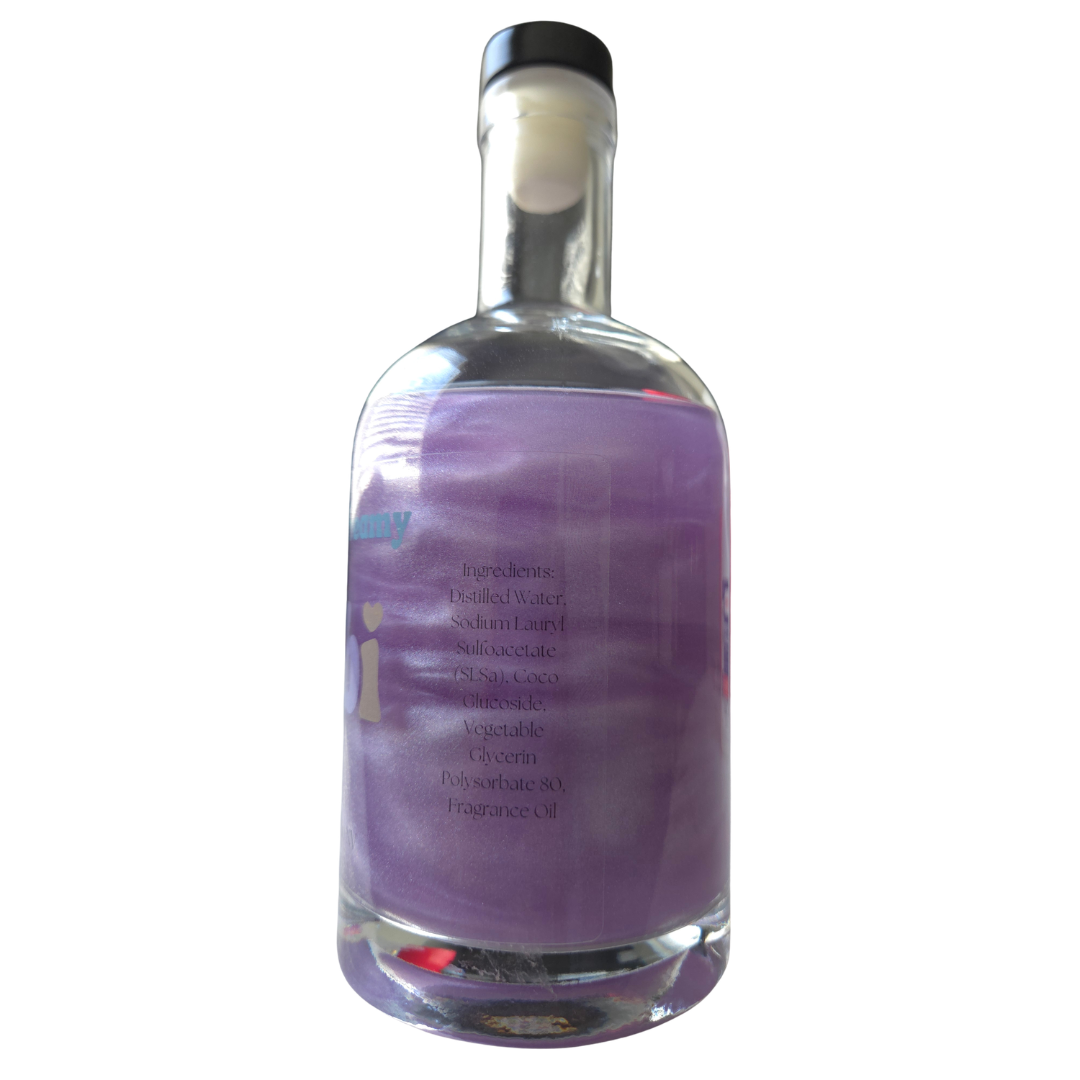 Clear glass bottle with a purple label on a white background